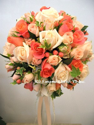 WEDB001 Peach & Champagne Roses Round Bouquet on the holder